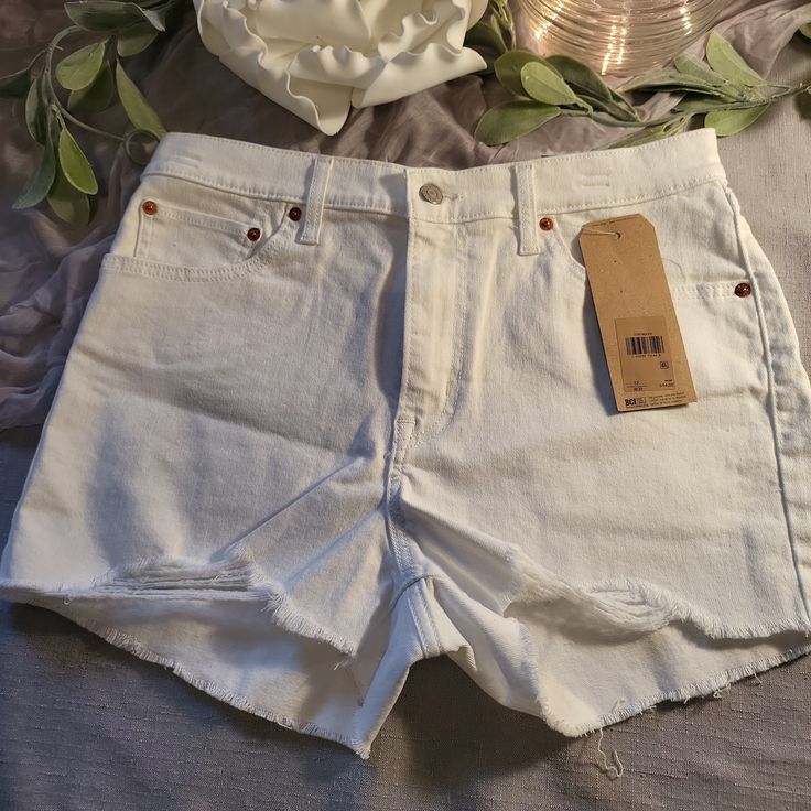 White Levi Jean Shorts Size 12 With Tags Levi's Summer Shorts For Spring, Levi's Cotton Jean Shorts For Summer, Levi's High Rise Shorts For Summer, Levi's Cotton Bottoms For Summer, Levi's High Waist Shorts For Spring, Levi's Cotton Summer Bottoms, White High Rise Shorts For Day Out, Levi's Summer Cotton Bottoms, Levi's Cotton Bottoms For Spring