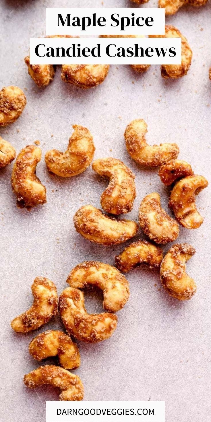 maple spice candied cashews on a baking sheet with text overlay that reads maple spice candied cashews