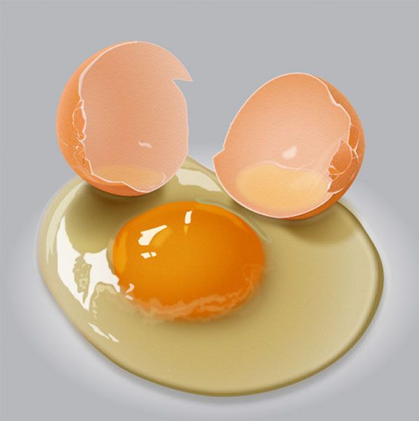 an egg is broken in half on a plate