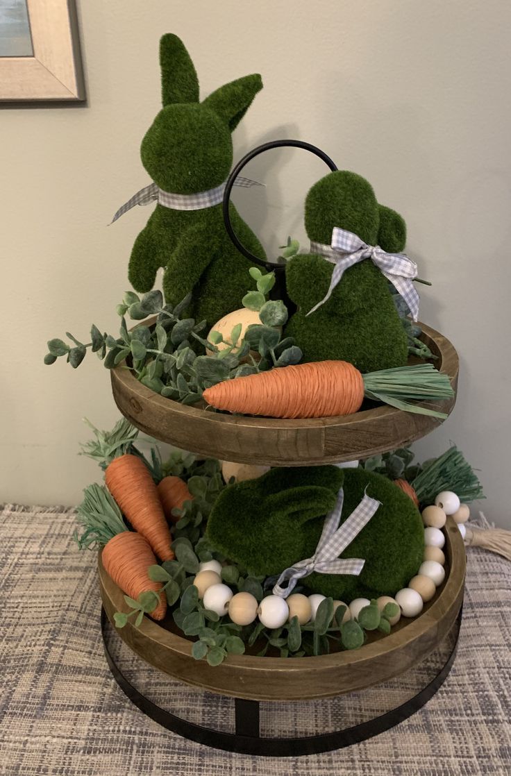 three tiered basket with carrots and grass rabbits