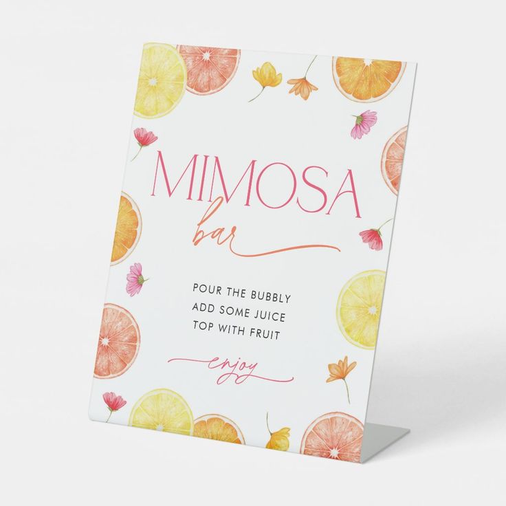 a close up of a greeting card on a white background with oranges and leaves