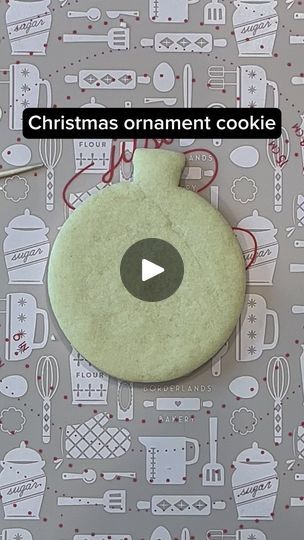 a christmas ornament cookie on a table