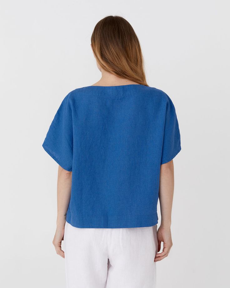 Loose fit linen top MIDWAY. Designed with a round neck and short sleeves making it feel breathable and light. This linen blouse will look great paired with jeans for a laid back and relaxed look, making it a perfect choice for all your daily activities.• Medium weight linen (approx. 180 gsm) Discover more colors of the MIDWAY top! Please note that due to the many variations in monitors and browsers, actual colors may vary. Indigo Relaxed Fit Top For Summer, Blue Linen Tops For Everyday, Relaxed Blue Tops For Summer, Relaxed Blue Crew Neck Top, Relaxed Short Sleeve Top For Summer, Indigo Relaxed Fit Crew Neck Top, Relaxed Blue Summer Blouse, Indigo Summer Tops For Everyday, Indigo Summer Tops For Everyday Wear