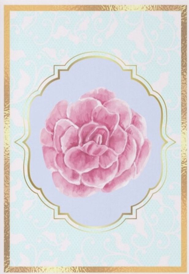 a pink flower on a blue and white background with gold border around the edges, in an ornate frame