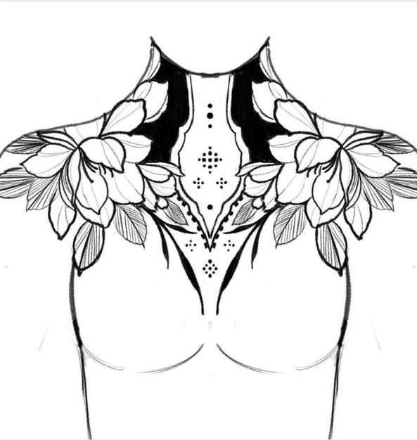 the back of a woman's chest with flowers on it