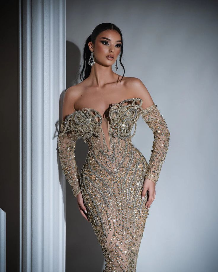 Taxes + Shipping included! Glamorous Gold Embellished Mini Dress, Gold Long Sleeve Dress For Gala, Gold Long Sleeve Gala Dresses, Glamorous Gold Mini Dress, Glamorous Gold Embellished Evening Dress, Glamorous Gold Mini Evening Dress, Gold Long-sleeve Evening Dress For Gala, Gold Mini Dress For Evening, Glamorous Style, Gold Long Sleeve Gala Evening Dress