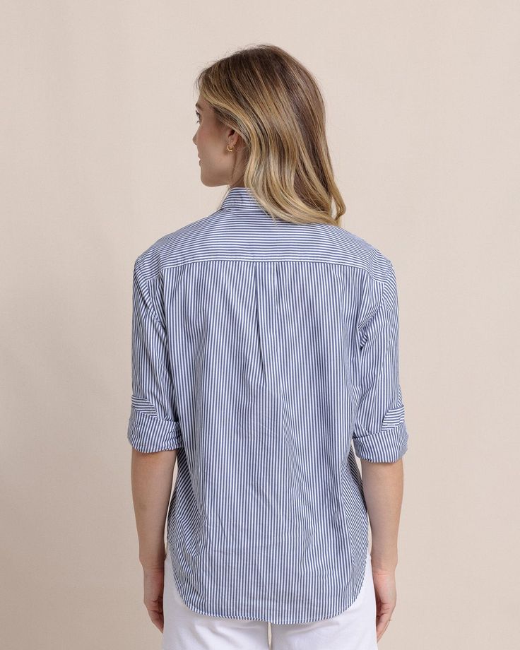 Polished and professional, this long-sleeve button-down gives you timeless style from the boardroom to the boardwalk. Our soft cotton top features a shirt tail hem and button cuffs for a custom fit that's both sophisticated and casual. Style: 10871 Classic Tops With Rolled Sleeves For Casual Gatherings, Classic Fall Blouse For Casual Gatherings, Classic Long Sleeve Blouse For Casual Gatherings, Classic Blouse With Shirttail Hem For Casual Gatherings, Casual Shirttail Hem Top With Button Cuffs, Classic Tops With Roll-up Sleeves For Casual Gatherings, Relaxed Fit Blouse With Rolled Sleeves For Business Casual, Classic Shirt With Rolled Sleeves For Casual Gatherings, Long Sleeve Shirt With Button Cuffs For Casual Gatherings