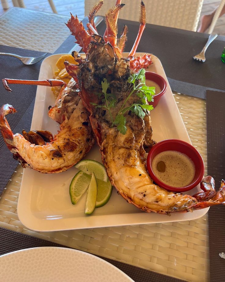 the meal is prepared and ready to be eaten on the table at the beachside restaurant