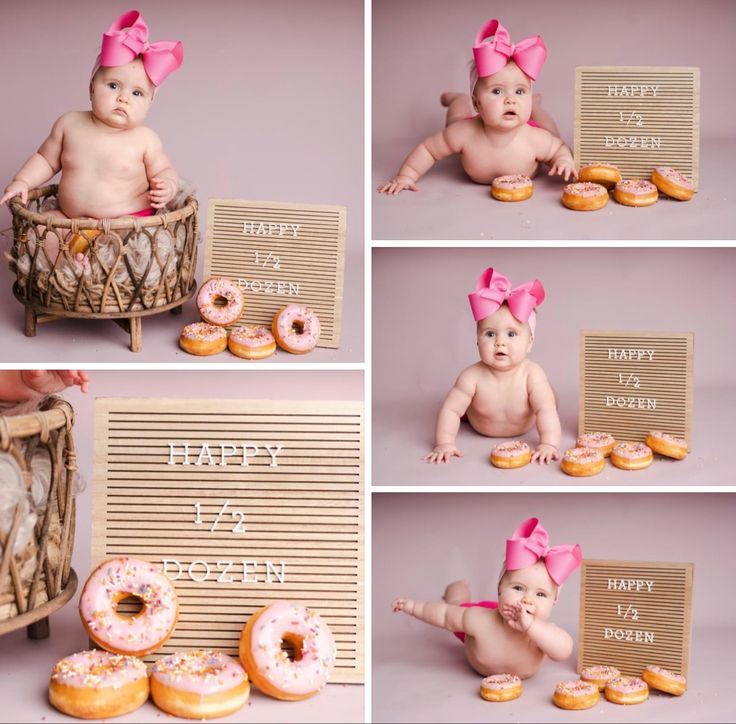 a baby sitting in a basket with doughnuts