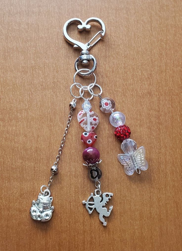 a key chain with charms attached to it