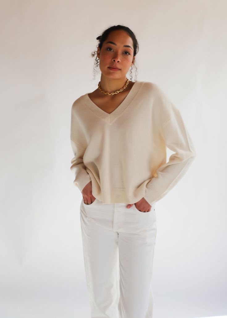 Anine Bing Lee Sweater | Tula Online Boutique Oversized Cream V-neck Sweater, Oversized Neutral V-neck Sweater, Cream Cashmere V-neck Sweater For Winter, White Cashmere V-neck Sweater For Fall, Cream Cashmere V-neck Sweater, Chic V-neck Sweater In Winter White, Chic Cream V-neck Sweater For Fall, Elegant Oversized V-neck Sweater, Chic Cream V-neck Sweater