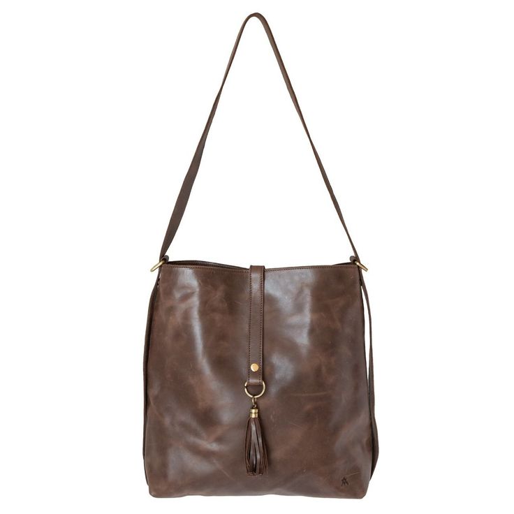 This eco-friendly, full grain leather slingback is perfect for the girl looking for functionality! It serves as a slouchy bucket bag, crossbody, and backpack! A beautifully hand-made piece, just pull on the straps for an over the shoulder look, or wear it like a crossbody to mix this bag into your on-the-go lifestyle. This bag is fully-lined and comes with a detachable fringe accessory. With plenty of storage and zip compartments to keep your tablet and valuables safe, this backpack is perfect f Everyday Leather-lined Crossbody Bucket Bag, Versatile Bucket Bag With Leather Lining For Everyday Use, Brown Bucket Backpack For On-the-go, On-the-go Leather Bucket Backpack, Versatile Brown Bucket Bag With Leather Lining, Chic Brown Shoulder Backpack, Chic Brown Backpack Shoulder Bag, Chic Brown Standard Backpack Shoulder Bag, Everyday Shoulder Bag With Leather Lining Backpack Style