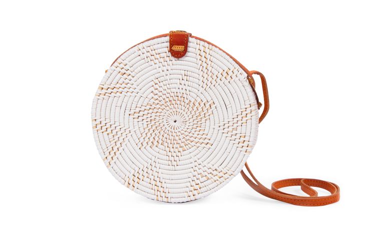 White Round Rattan Bali Crossbody Handbag White Straw Crossbody Bag For Summer, White Crossbody Straw Bag With Braided Handles, White Summer Crossbody Straw Bag, Summer White Straw Crossbody Bag, Summer White Crossbody Straw Bag, White Shoulder Bag With Round Handle For Travel, Summer Portable Crossbody Straw Bag, White Basket Shoulder Bag For Travel, Round Shoulder Bag For Everyday Use In Summer