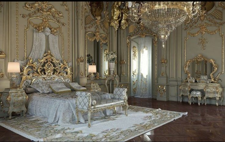 an elaborately decorated bedroom with chandelier and bed