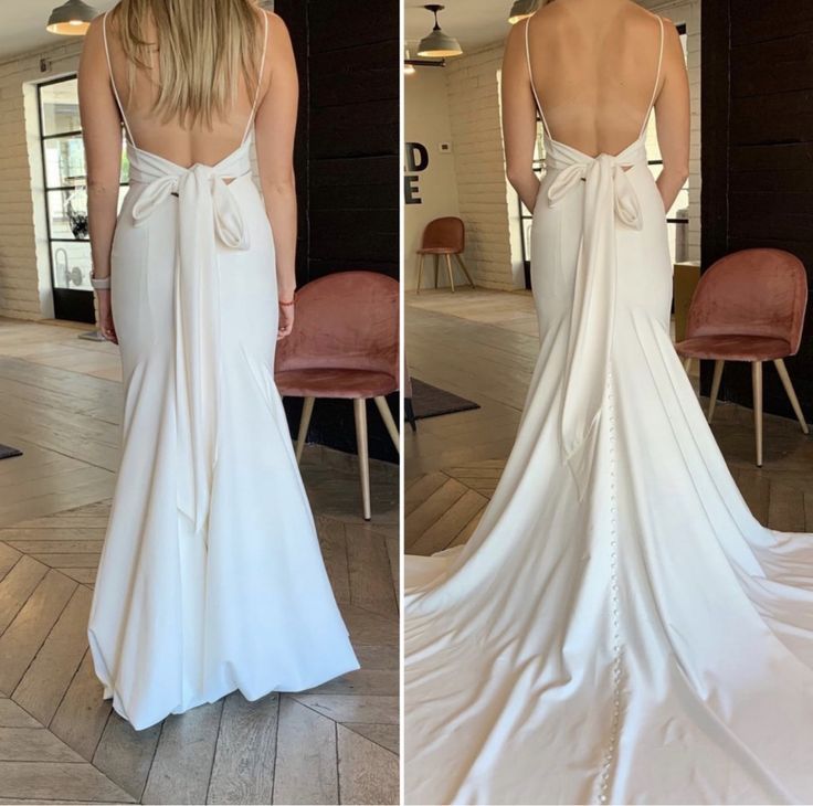 the back of a woman's white wedding dress, with an open back and bow at the waist