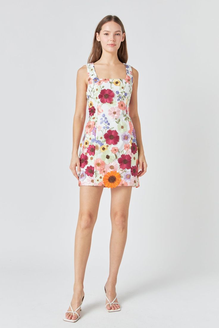 Introducing our Floral Embroidered Mini Dress the perfect blend of chic femininity and playful charm. This mini length dress boasts stunning floral embroidery adding a touch of elegance to any occasion. The back zipper ensures a secure fit while the sleeveless design allows for a flattering silhouette. Crafted with premium quality materials this dress is both comfortable and durable. Ideal for spring and summer it will be a staple in your wardrobe. Elevate your style game and turn heads with our Floral Embroidered Mini Dress. Don't miss out on this must-have piece! Mini length Floral embroidery Back zipper Sleeveless Lining Hand wash cold Do not bleach Iron low Do not tumble dry Exclusive of Decoration Shell: 100% Polyester Contrast: 95% Polyester 5% Spandex Lining: 100% Polyester HN3142D Chic Dresses With Floral Embroidery For Garden Party, Spring Mini Dress With Straight Neckline And Back Zipper, Fitted Sundress With Back Zipper, White Mini Dress With Back Zipper, Elegant Mini Dress With Floral Print And Square Neck, Fitted A-line Floral Dress With Embroidery, Floral Print Square Neck Mini Dress, Floral Embroidered Mini Dress For Garden Party, Spring Sundress With Back Zipper