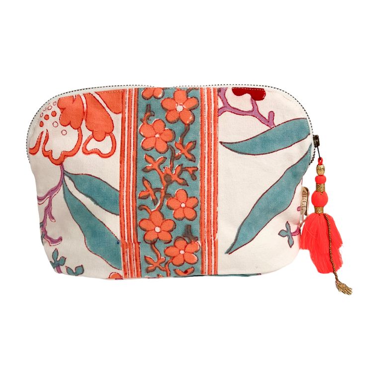 A fun zipper pouch featuring our signature tassel detailing. Zipper Pouch, Tassels, Pouch, Zipper