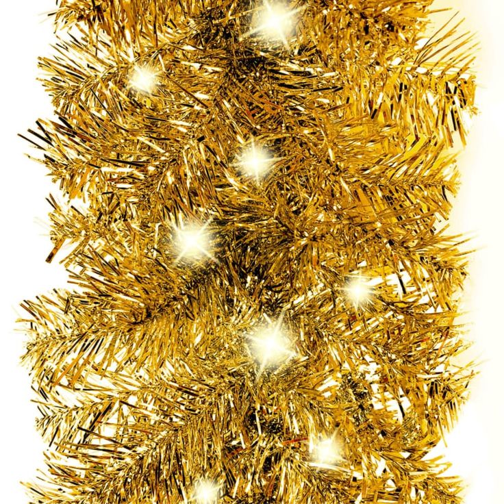 a gold tinsel christmas tree with white lights