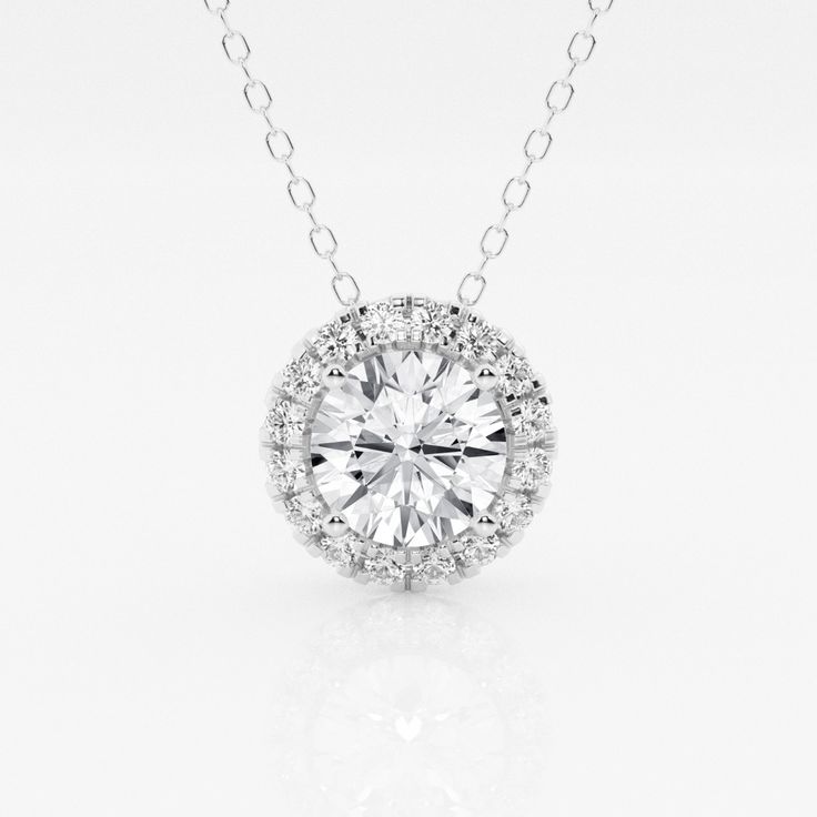 A diamond with a fine halo is better than none! This beautiful round lab grown diamond pendant is encircled with tiny shimmering smaller diamonds, to create a halo effect. Suspended by a delicate gold chain that slides through. Halo Setting, Halo Pendant, Bezel Set Diamond, Perfect Engagement Ring, Diamond Pendant Necklace, Diamond Halo, Halo Diamond, Cute Jewelry, Diamond Pendant