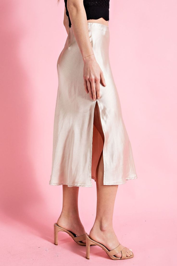 Classic satin fabric midi skirt with a side slit. 100 % POLYESTER Made in IMPORT Midi Satin Skirt, Champagne Gold Color, Modern Clothing, Champagne Toast, Satin Midi Skirt, Satin Skirt, Modern Outfits, Business Attire, Champagne Gold