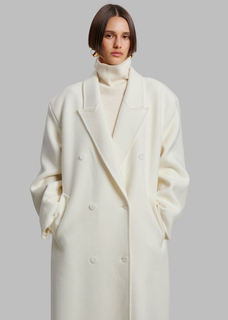 Color: Ivory Midweight wool blend fabric Oversized silhouette Peak lapels Drop shoulders Welt hip pockets Double breasted front button closure Lined 80% Wool 20% Polyamide Dry Clean By The Frankie Shop. Imported 2023 Color, The Frankie Shop, Frankie Shop, Oversized Coat, Double Breasted Coat, Oversized Silhouette, Autumn Outfit, Color Ivory, Black Coat