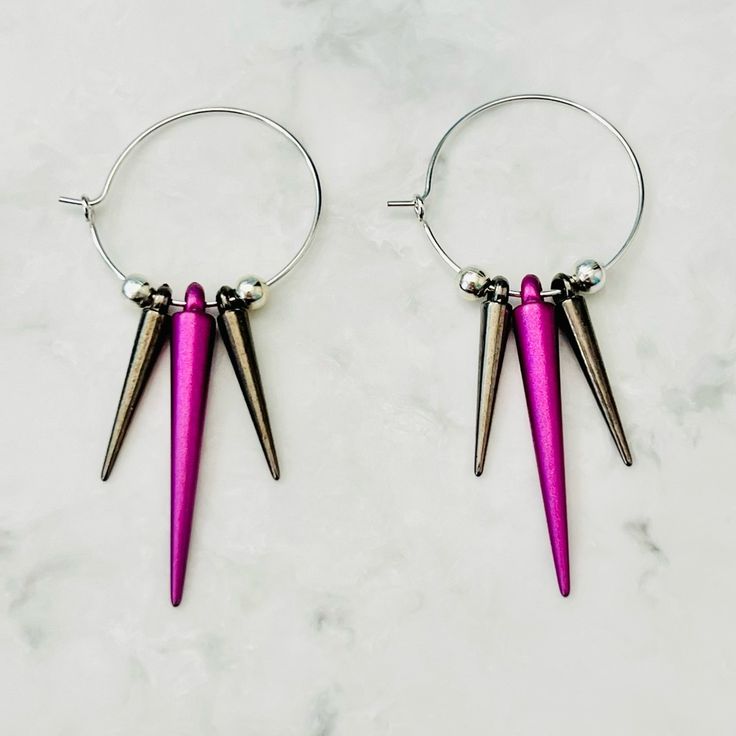 Handmade - Bright Fuchsia Pops Between The Gunmetal Spikes, Create This Edgy Pair Of Earrings. - Spike Beads - Acrylic - Silver Beads, Iron, 4mm - Hoops - Copper, 25mm, Hypoallergenic, Lead And Nickel Free Please Visit And Favorite My Shop: Https://Www.Etsy.Com/Shop/Wanderingbunnyshop Packaged With Care And Sent Straight To Your Door. Keywords: Spike Hoop Earrings, Spike Earrings, Minimalist Earrings, Hoop Earrings, Small Hoop Earrings, Silver Earrings, Goth Earrings, Punk Earrings, Punk Earring Black And Pink Earrings, Edgy Pink Metal Jewelry, Edgy Adjustable Pink Jewelry, Adjustable Edgy Pink Jewelry, Edgy Pink Party Jewelry, Small Hoop Pink Metal Earrings, Pink Small Hoop Metal Earrings, Pink Small Hoop Earrings In Metal, Pink Punk Jewelry For Party