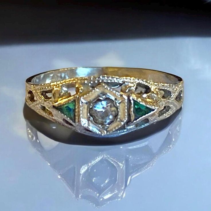 Antique 14k Yellow Gold BABY Emerald and Diamond Ring Size 1 PRETTY! Beautiful baby ring!! * Size 1 * Crafted with great detail, this pretty little yellow gold ring has a small diamond center and emerald accents! * Weighs .7 gram Will ship FAST and FREE, fully insured in a gift box:) Please shop with confidence as I guarantee item to be as described and pictured. Heirloom Yellow Gold Birthstone Ring Stamped 14k, Heirloom Yellow Gold Birthstone Diamond Ring, Gold Ring With May Birthstone In Art Deco Style, Art Deco Gold Ring With May Birthstone, Gold Art Deco Ring With May Birthstone, Antique 14k Gold Birthstone Ring For Promise, Heirloom Silver Birthstone Ring In 14k Gold, Heirloom 14k Gold May Birthstone Ring, 14k Gold Diamond Cut Ring For May Birthstone