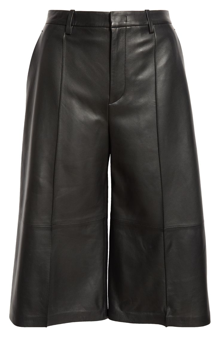 A longer length brings edgy style to these leather shorts that'll smoothly slip into high rotation with their versatile design. 16" inseam; 26" leg opening; 11" front rise; 13 1/2" back rise (size 8) Zip fly with hook-and-bar closure Front slant pockets; back welt pockets Leather Professional leather clean Imported Elegant Leather Shorts, Fitted Leather Shorts For Work, Modern Knee-length Bottoms For Fall, Elegant Short Leather Bottoms, Black Leather Shorts For Fall, Classic Knee-length Leather Bottoms, Fitted Leather Shorts For Fall, Fitted Leather Shorts, Leather Shorts With Belt Loops For Fall