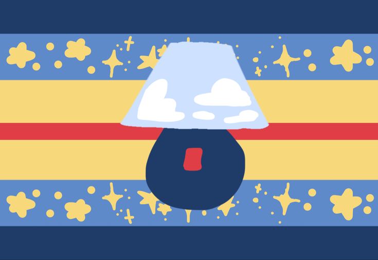 a lamp that is sitting on top of a blue and yellow striped table cloth with stars around it