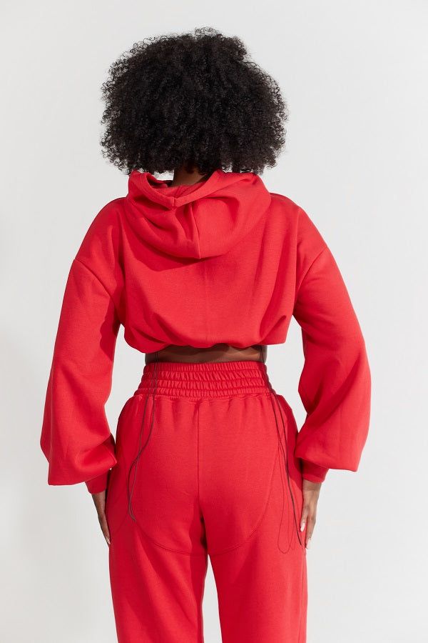 Introducing our stunning Reddit best Red Joggers! These are not your average sweatpants - they are a fashion statement. Our sweatpants are designed to give you the ultimate comfort with a stylish edge. With a sexy front cut-out detail, corded back waist with stitch detailing and hoodie, this cropped corset hoodie emphasizes your curves and screams casual yet chic and edgy. Details Colour: Red Design Elastic shock cord with soaring loaded toggle clamp on back waist Stitch detailing Ribbed cuff de Corset Hoodie, Womens Corset Tops, Cropped Corset Top, Best Joggers, Red Sweatpants, Red Joggers, Cropped Corset, Corset Tops, Triangle Bralette