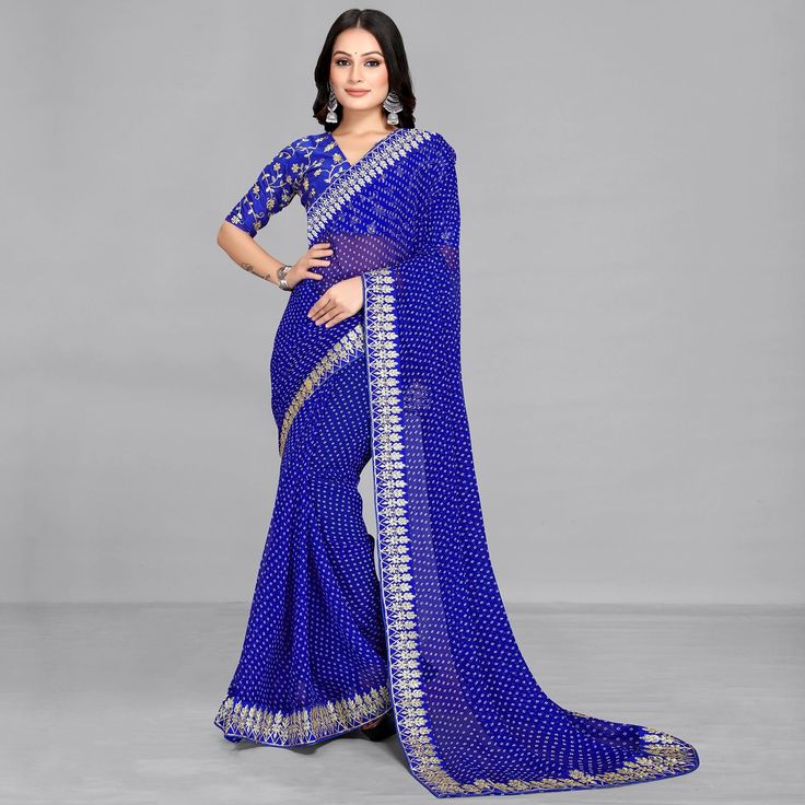 Blue colored saree is made from georgette fabric which is highlighted with beautiful bandhani print and embroidered lace work as shown. comes along unstitched embroidered banglori silk blouse piece which you can customise as per your design/style. Occasion - You can wear this saree for festivals and functions. Note:- The actual product may differ slightly in color and design from the one illustrated in the images when compared with computer or mobile screen. Measurements: Saree : Georgette : 5.5 Bandhani Print, Saree Georgette, Mobile Screen, Georgette Saree, Georgette Fabric, Georgette Sarees, Embroidered Lace, Blouse Piece, Design Style