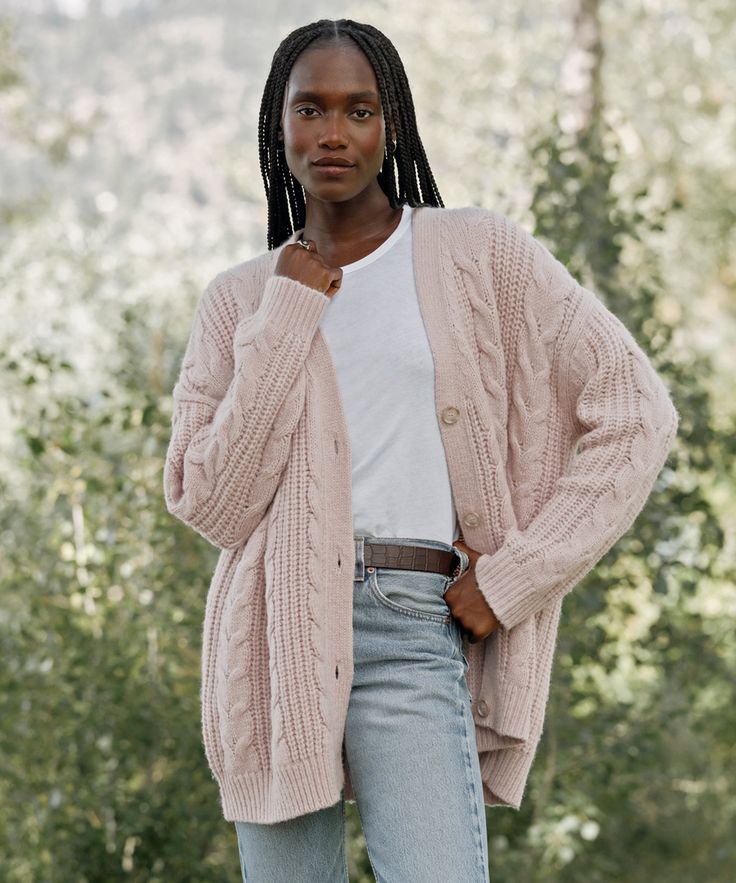 Cable Cocoon Cardigan Blush Using our best-selling cardigan as inspiration, our take on the chunky cable knit sweater is the latest layer you'll want to collect in every color. The luxuriously lightweight feel makes for the perfect year-round wear—whether paired with sweats or styled with a dress. 39% baby alpaca, 39% merino wool, 22% nylon. Made in China of Italian yarn. Lofty cable knit sweater with a relaxed silhouette. Faux-horn buttons. Due to the nature of the fabric, slight shedding may o Trendy Cable Knit Cardigan For Layering, Cozy Cable Knit Relaxed Fit Cardigan, Spring Cable Knit Cardigan For Layering, Cozy Cable Knit Cardigan For Layering, Trendy Pink Cable Knit Outerwear, Relaxed Fit Cable Knit Cardigan For Layering, Spring Cable Knit Loungewear Cardigan, Spring Cable Knit Cardigan For Loungewear, Spring Cable Knit Relaxed Fit Outerwear