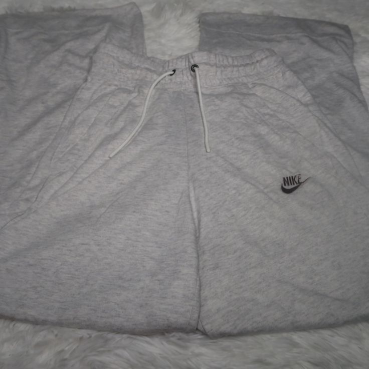 Size Xs New With Tags Lightweight Cotton-Poly Blend Feels Super Soft And Is Made From Recycled Materials Elasticated Cuffs And Waistband Offer A Comfortable, Secure Fit Nike Loungewear Trousers, Nike Sweatpants For Loungewear, Nike Jogger Trousers For Loungewear, Nike Cotton Sweatpants Full Length, Nike Cotton Full-length Sweatpants, Fitted Nike Cotton Bottoms, Fitted Cotton Nike Bottoms, Nike Casual Wide Leg Bottoms, Gray Sportswear Bottoms For Spring