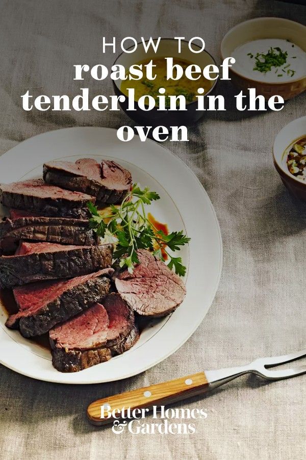 roast beef tenderizing in the oven on a plate with garnish and parsley