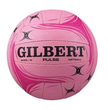 a pink and black ball with the word gilbert written on it, against a white background