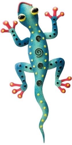 a blue frog with yellow dots on it's body and legs, standing in the air