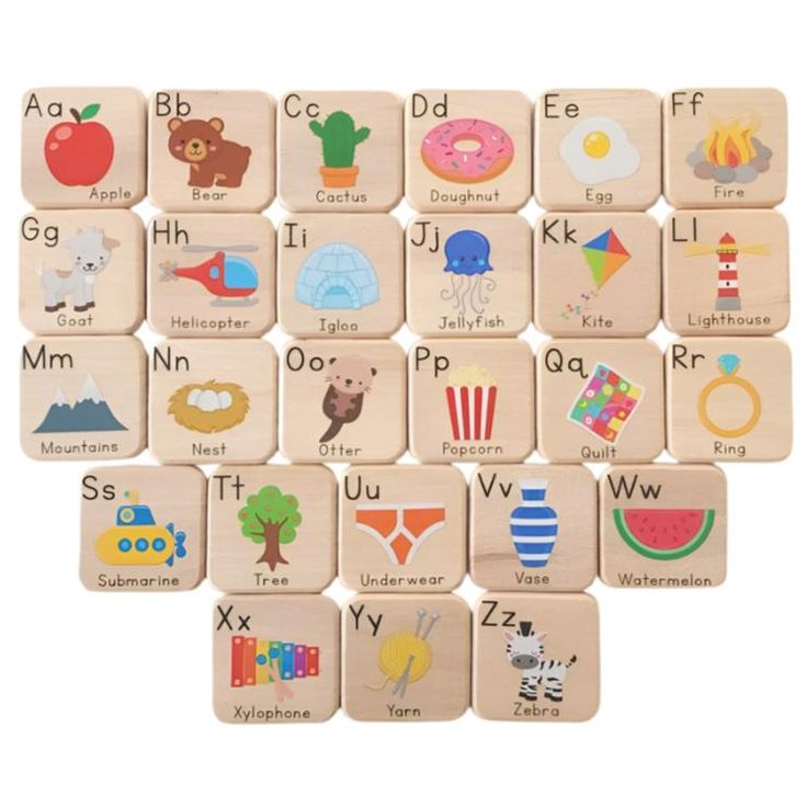 wooden alphabets with pictures of animals, letters and numbers are arranged in the shape of squares