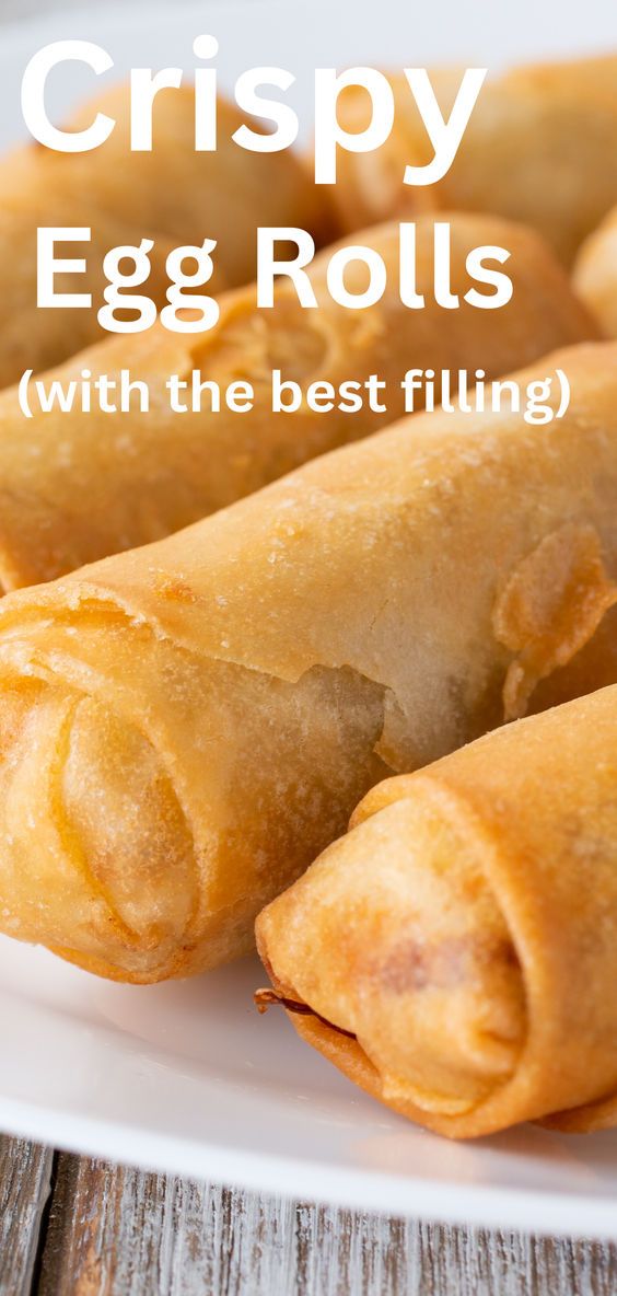 crispy egg rolls on a white plate with the title overlay reads crispy egg rolls with the best filling