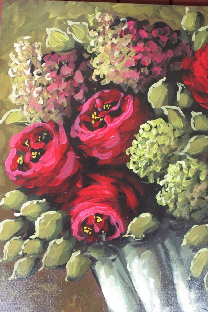 a painting of red and green flowers in a white vase on a brown tablecloth