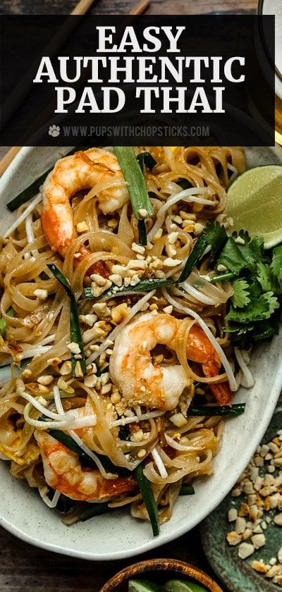 pad thai noodles with shrimp and vegetables on a plate