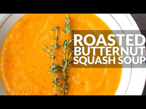 a bowl of roasted butternut squash soup with the words roasted butternut squash soup