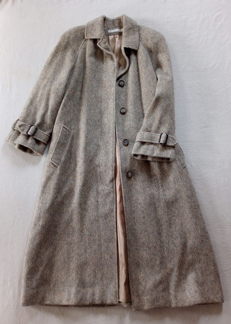 "Excellent condition Perry Ellis, Union Made fur overcoat. Size 8. Tags do not indicate the type of materials but this coat is amazingly soft, smooth, and heavy. My personal guess would be lambswool or angora. Approximate measurements: 36\" from the underarm to the bottom hem, and 22.5\" sleeves." Beige Winter Fur Coat, Winter Beige Wool Fur Coat, Beige Wool Fur Coat For Winter, Winter Wool Fur Coat In Beige, Wool Fur Coat For Cold Weather In Fall, Classic Long Wool Outerwear, Classic Beige Fur Coat For Workwear, Classic Long Fur Coat For Fall, Classic Lambswool Outerwear For Winter