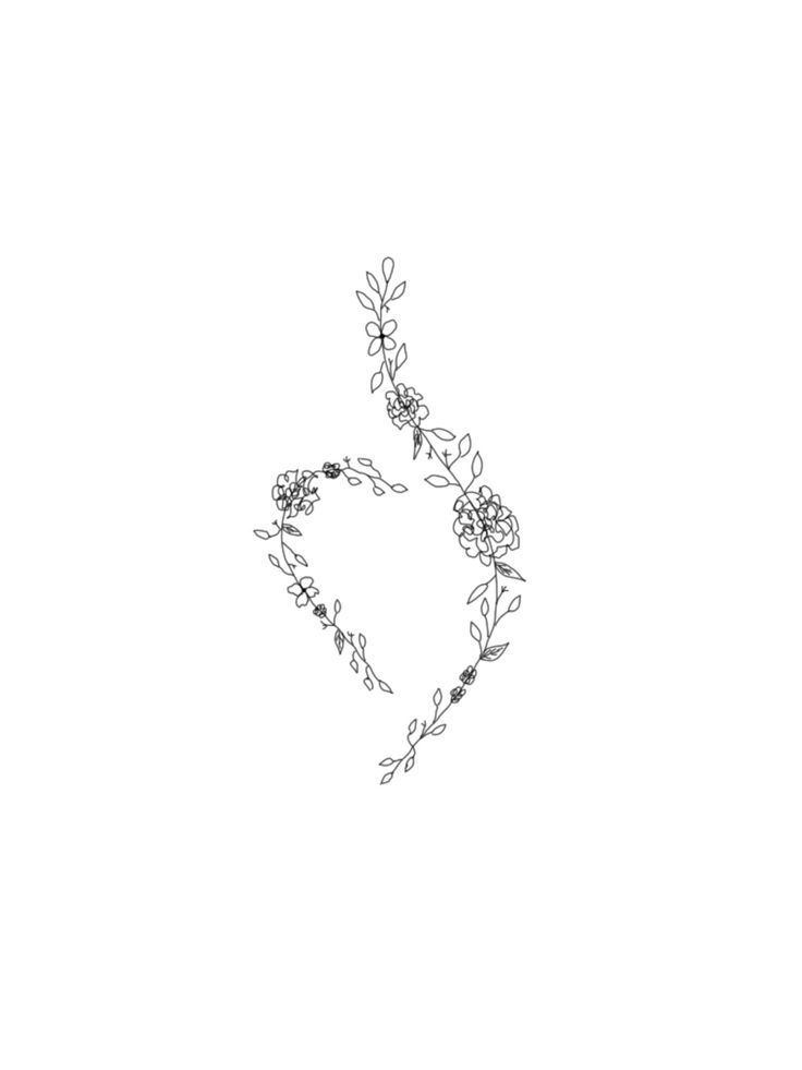 a black and white drawing of a heart with flowers