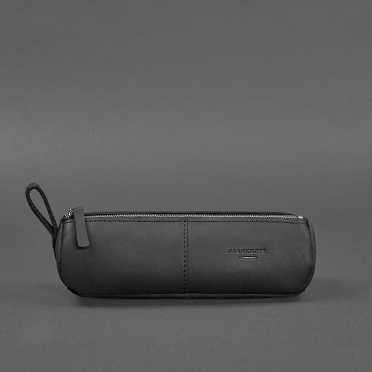 A leather pencil case-cosmetic bag is a versatile accessory that can be used to store any small items. Such an accessory will be good as a pencil case, glasses case, organizer for hygiene items, and other small things. The cosmetic bag is made of high-quality natural leather. This leather is incredibly soft and durable. The inner surface has a velvety, well-finished texture, so there is no need to make a lining. The pencil case-cosmetic bag is closed with a metal zipper. There is a leather loop Classic Rectangular Everyday Pencil Case, Black Leather Rectangular Pencil Case, Classic Rectangular Pencil Case, Classic Rectangular Pencil Case For Everyday Use, Everyday Leather Pouch In Rectangular Shape, Minimalist Rectangular Pouch, Black Rectangular Pencil Case For Everyday Use, Modern Everyday Pencil Case Pouch, Classic Rectangular Pencil Case For Daily Use