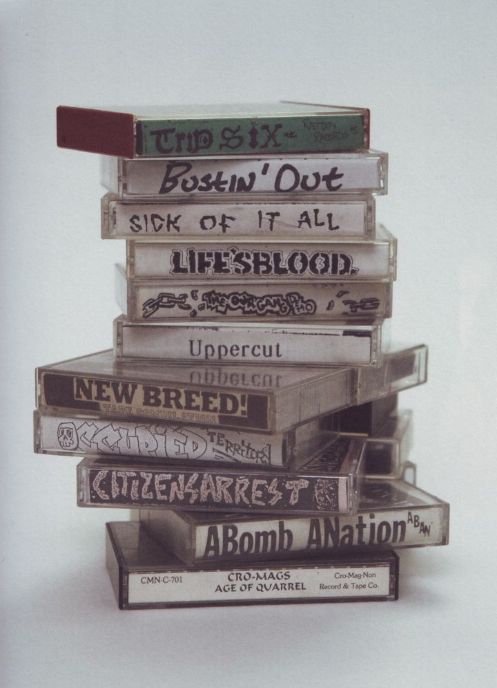 a stack of cassettes stacked on top of each other in front of a white background