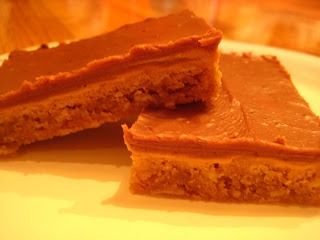 two pieces of cake sitting on top of a white plate