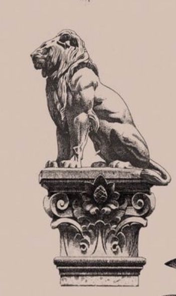 an image of a lion statue on top of a pillar