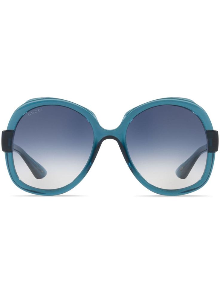 teal blue acetate round frame blue tinted lenses gold-tone logo plaque straight arms curved tips These glasses come with a protective case. Round Eyewear, Frame Blue, Gucci Eyewear, Tinted Sunglasses, Round Frame, Teal Blue, Protective Cases, Round Sunglasses, Lenses