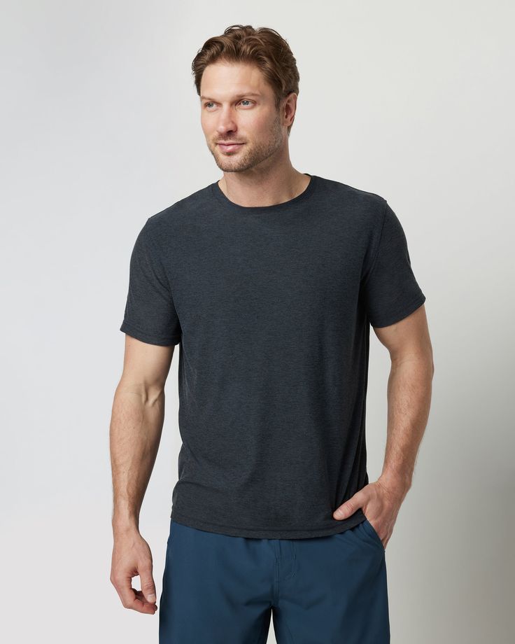 The Strato Tech Tee is the softest piece of workout apparel on the planet, doubling as your go-to t-shirt. With next-level comfort, our softest performance knit is moisture wicking. | Vuori Strato Tech T-Shirt / Tee | Charcoal Heather | XS Vuori makes premium performance apparel inspired by the active Coastal California lifestyle; an integration of fitness, surf, sport, and art. Breaking down the boundaries of traditional activewear, we are a new perspective on performance apparel. Gray Crew Neck Activewear For Loungewear, Gray Relaxed Fit Top With Go-dry Technology, Versatile Moisture-wicking Crew Neck T-shirt, Gray Relaxed Fit Activewear With Crew Neck, Gray Moisture-wicking Tops For Loungewear, Gray Relaxed Fit Crew Neck Activewear, Gray Go-dry T-shirt For Workout, Heather Grey Athleisure Activewear, Relaxed Fit, Heather Grey Relaxed Fit Athleisure Activewear