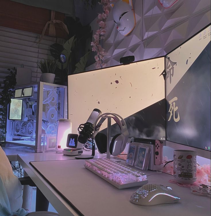 a desktop computer sitting on top of a desk next to a keyboard and mouse in front of a monitor